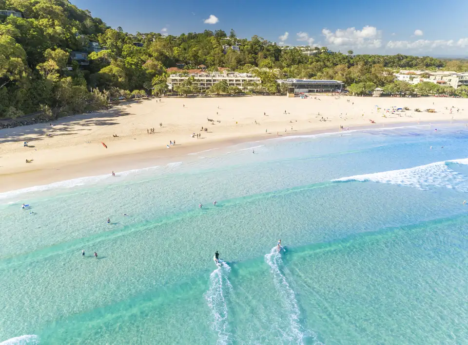 Aerial view of Noosa Main Beach, turquoise water and golden sand